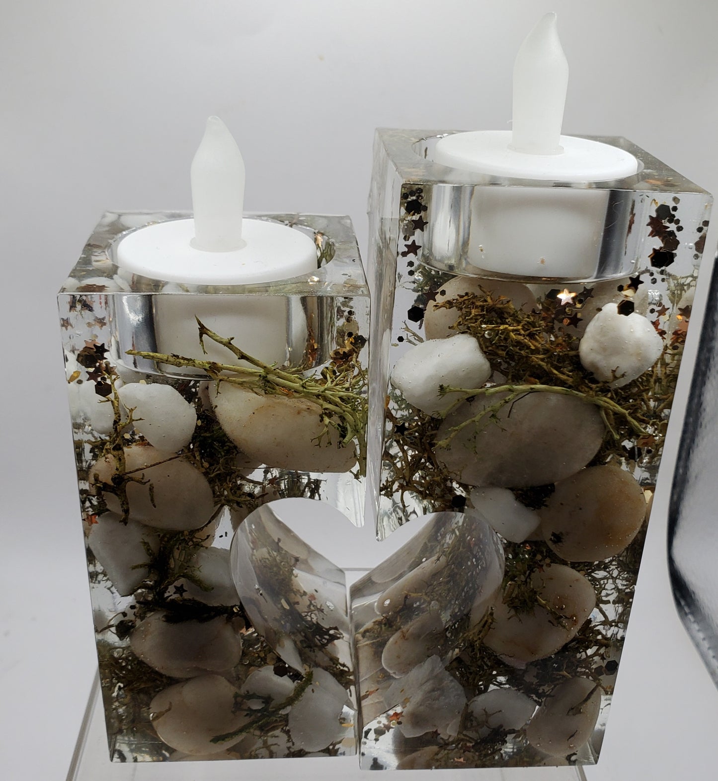 Add a warm and cozy ambiance to your home with this beautiful candle holder, a must-have for any decor