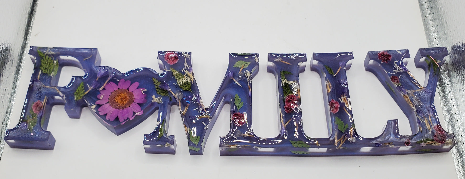 Add a cozy touch to your home with this delightful sign, adorned with a heart, ideal for home decor enthusiasts.